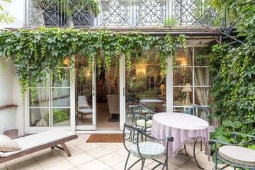 veranda recouverte de plantes